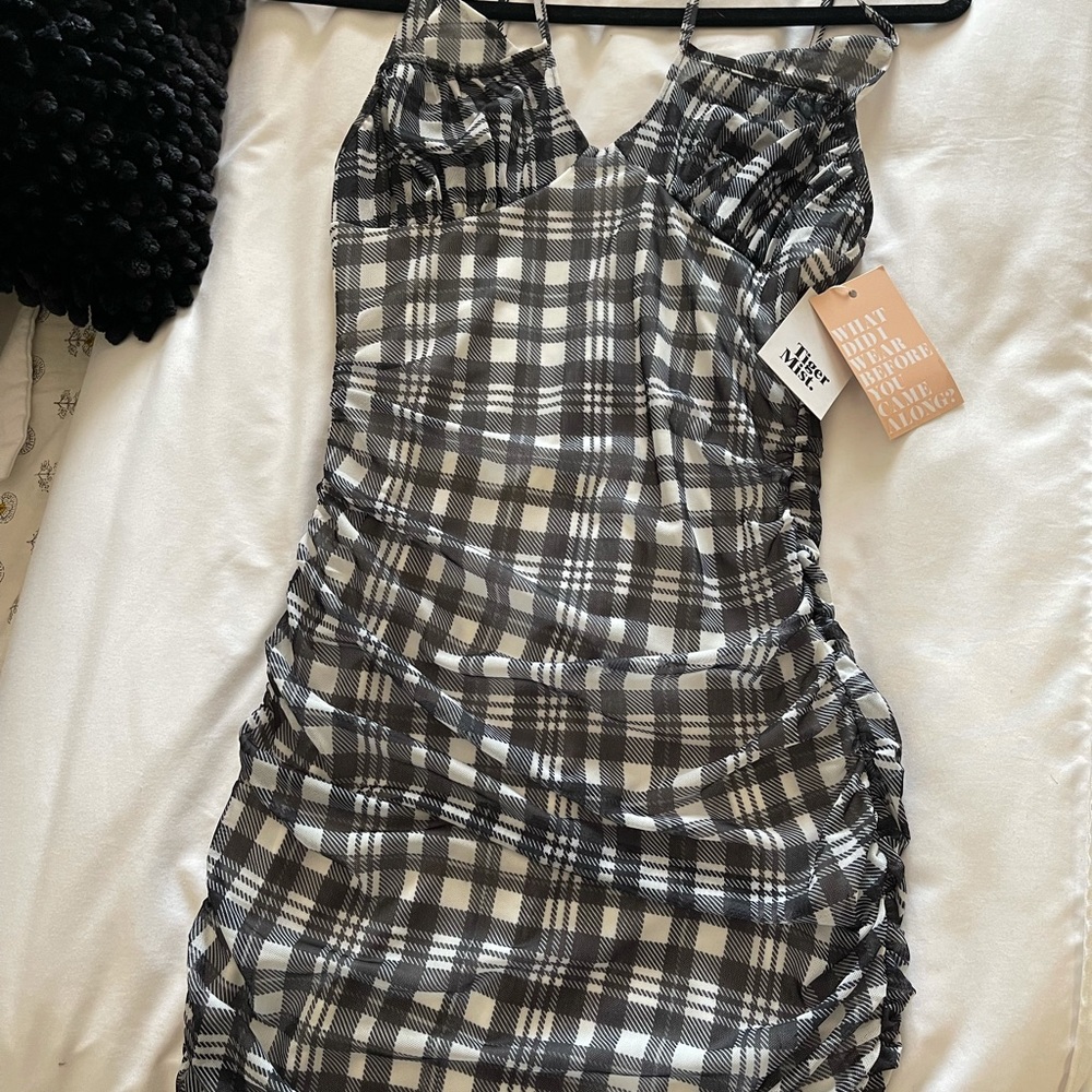 Never worn. Price tags attached